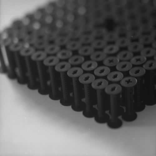 <body>
<p>This work was initially conceived of as a nod to the Terracotta Army of the Qin Emperor. Seeing that the film size ‘120’ for which these spools were manufactured is numerically 11²-1, I arranged this as a phalanx of 11 ranks of 11 and left the centre element out.</p>
<p>I thought I could also look at this omission as a flaw in the lattice and to see how the structure behaved over time, perhaps to model the corruption of power while I worked on the Dissent project with Chapel Arts. </p>
</body>
 Images Copyright Aldobranti® ©2008-'2025. All rights reserved.